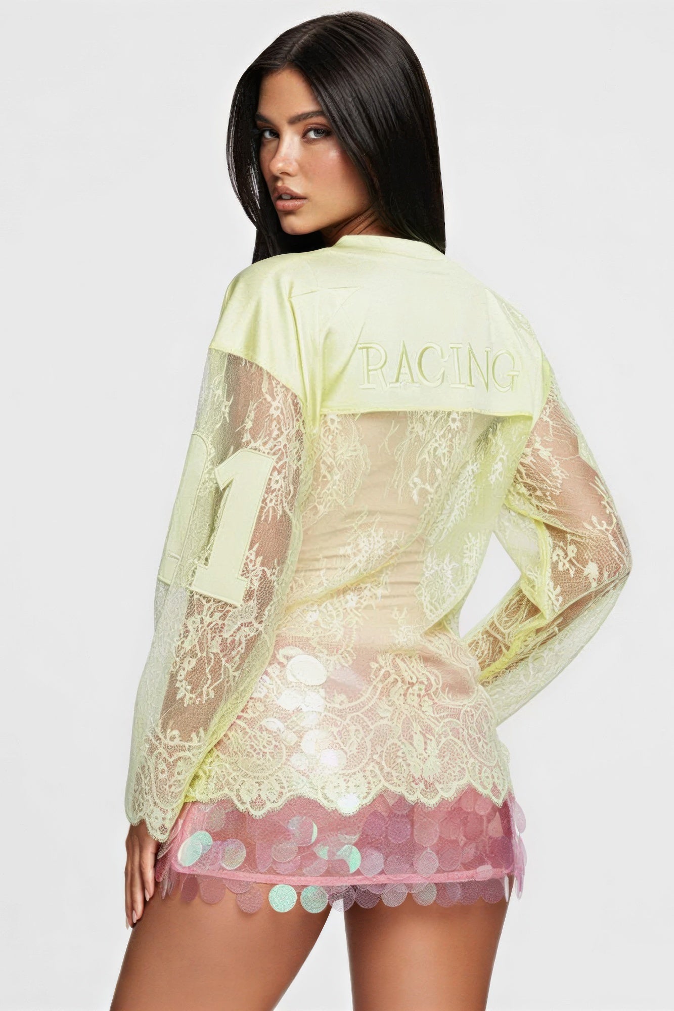 Long sleeve jersey top with graphic featuring lace detailing and rhinestones, styled in a relaxed fit.