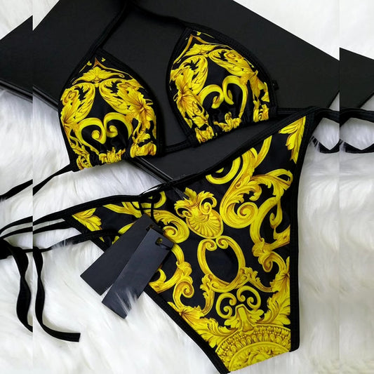 Luxury print swimsuit bikini set featuring bold yellow and black design, perfect for summer beach outings.