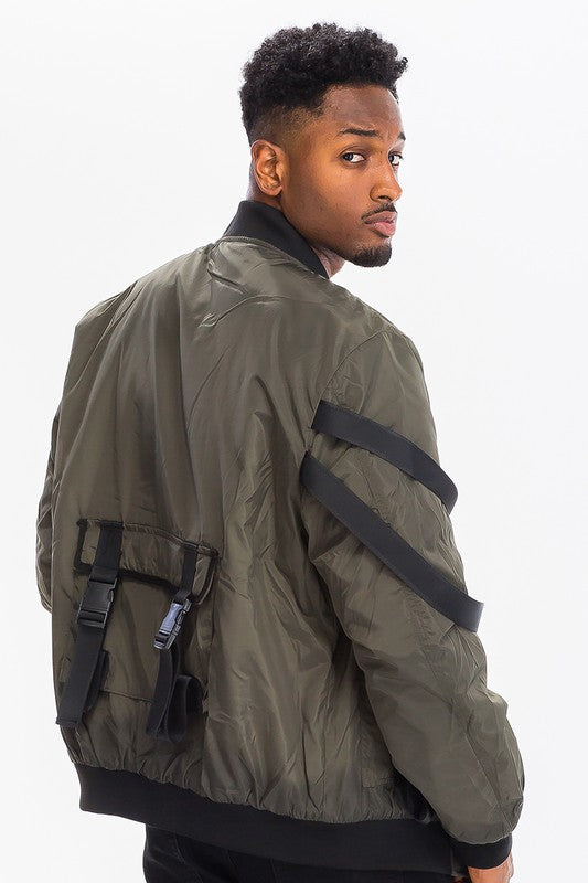 Utility Strap Jacket showcasing tactical utility bomber jacket with adjustable straps and buckles on a model.