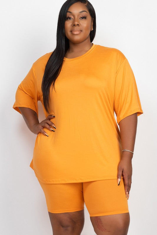 Plus size biker shorts set featuring a loose fit orange top and matching biker shorts, perfect for comfort and style.