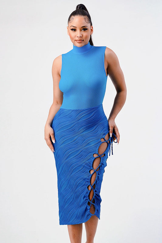 ocean blue sleeveless midi dress with textured fabric and side cutouts