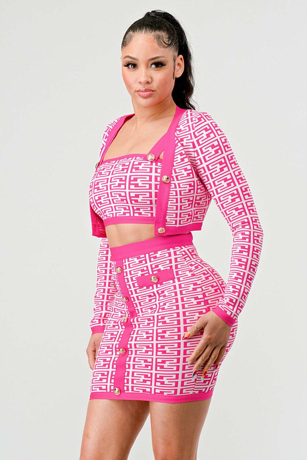 Barbie pink three piece set featuring a geometric print and stylish crop top with high-waisted shorts.