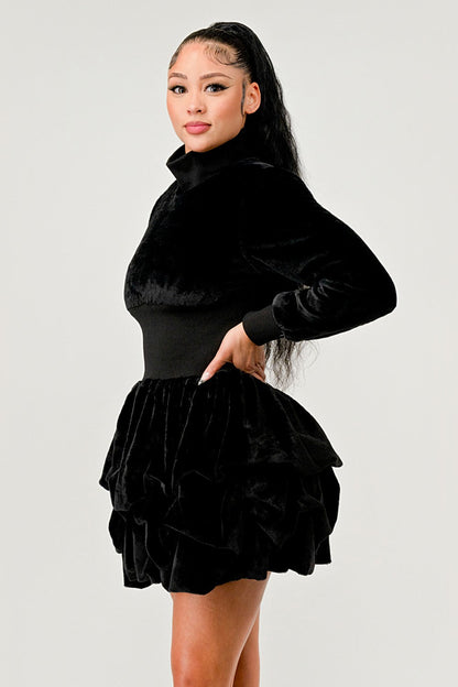Merry Go Around Ruffle long sleeve dress showcased on a model featuring a sophisticated ruffled hem and elegant design.