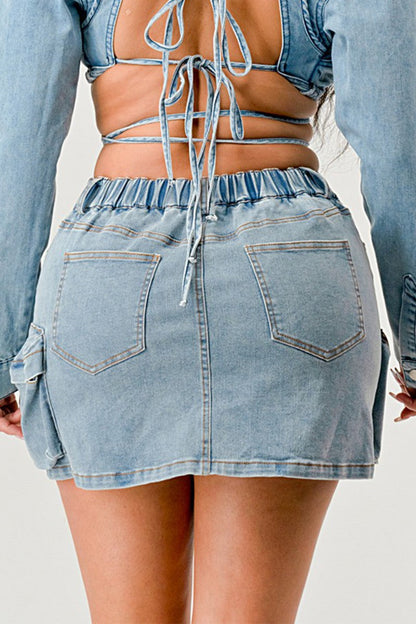 Back view of a Denim Daze Wrap Skirt showcasing its adjustable fit and cute side pocket detail.