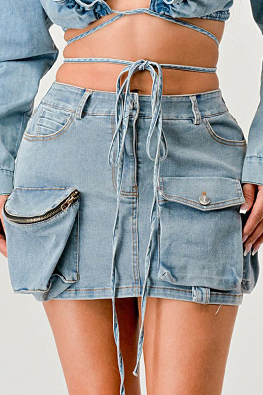 Denim Daze Wrap Skirt featuring adjustable drawstrings and zipper pocket detail, showcasing a modern denim wrap skirt style.