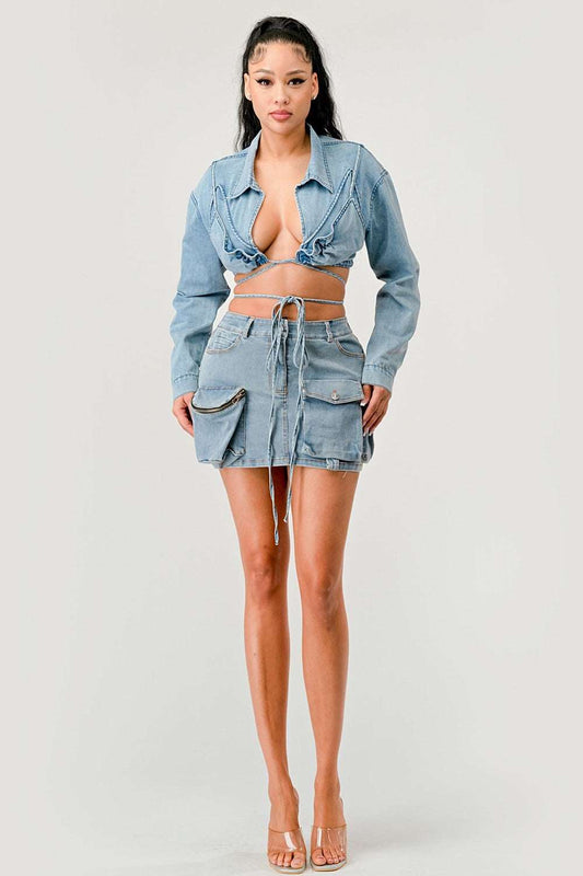 Cropped denim jacket with tie-front styled over matching skirt.