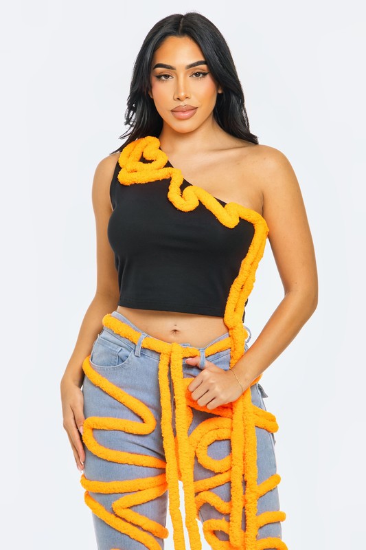 Asymmetrical crop top featuring vibrant orange contrast piping and a one-shoulder design for a bold silhouette.