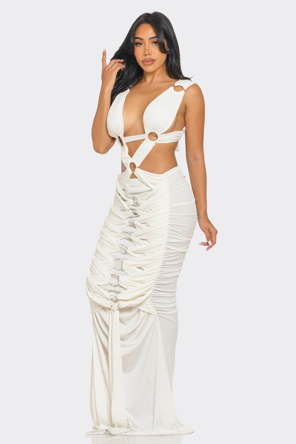 Sahara Mystique Pleated Gown, elegant pleated gown for special occasions, showcasing unique pleated design and circular accents.