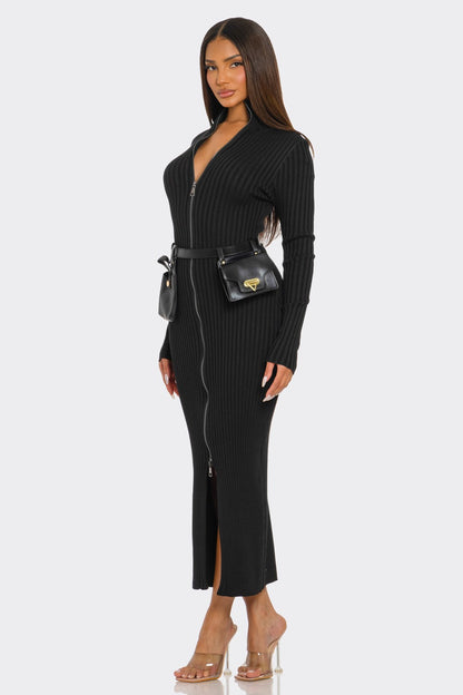 Model wearing a ribbed knit utility dress with a zipper and utility belt featuring mini pouches.