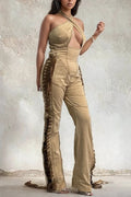 Desert Heat Crisscross Halter Lace-Up Denim Jumpsuit showcasing a daring design and fitted silhouette.