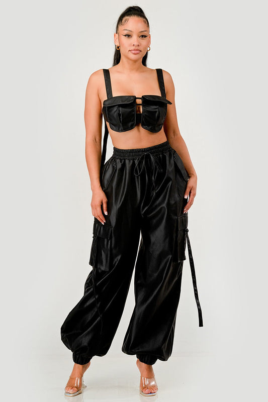 Black utility crop top cargo pants set featuring adjustable straps and multiple pockets.
