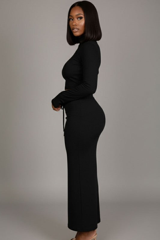 Mock neck crop top and maxi skirt set showcased on a model, highlighting the chic silhouette and elegant design.