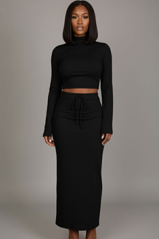 Mock neck crop top and maxi skirt set featuring adjustable waist and bell sleeves for a chic look.