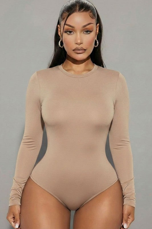 Solid long sleeve round neck bodysuit in soft beige, featuring a seamless silhouette and form-fitting design.