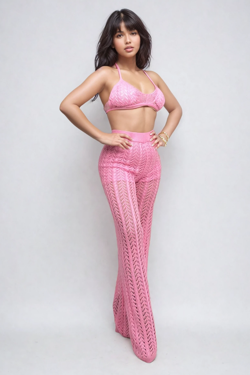 Pink crochet halter top and wide-leg pants set by ATHINA RETAIL, featuring a stylish, coordinated summer outfit.