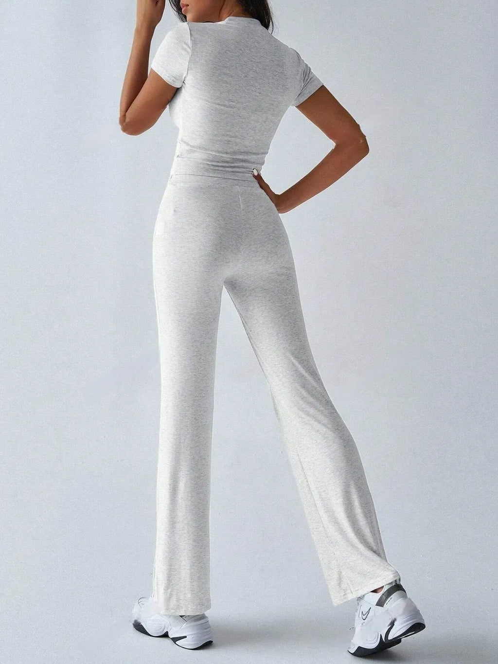Round Neck Short Sleeve Top and Pants Set in a cozy light gray look, ideal for casual outings and comfort.