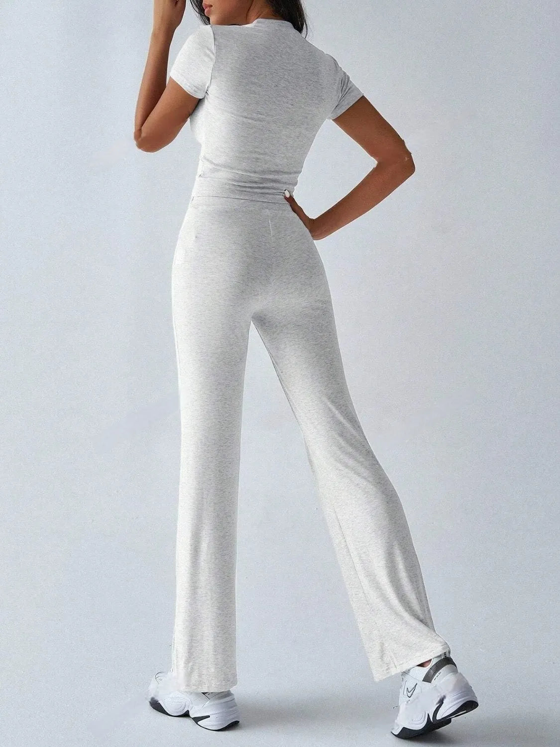 Round Neck Short Sleeve Top and Pants Set in a cozy light gray look, ideal for casual outings and comfort.