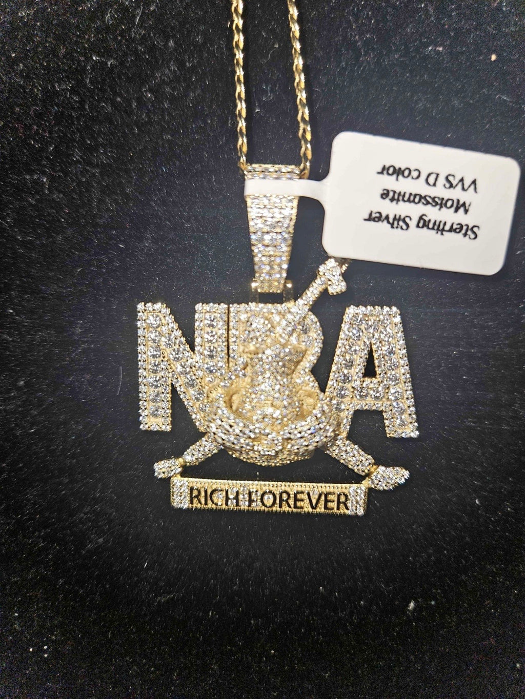 NBA moissanite pendant chain featuring luxurious iced-out design with sparkling stones and distinctive lettering.