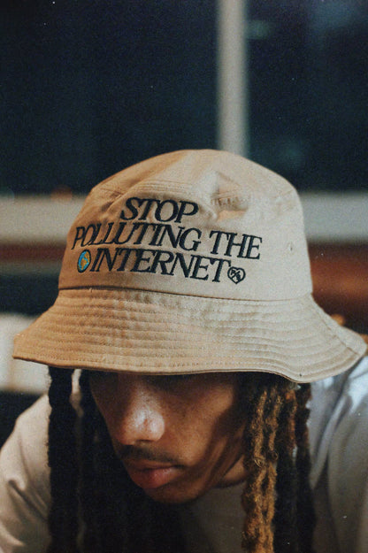 Graphic statement bucket hat featuring the phrase 'Stop Polluting the Internet', designed for style and comfort.
