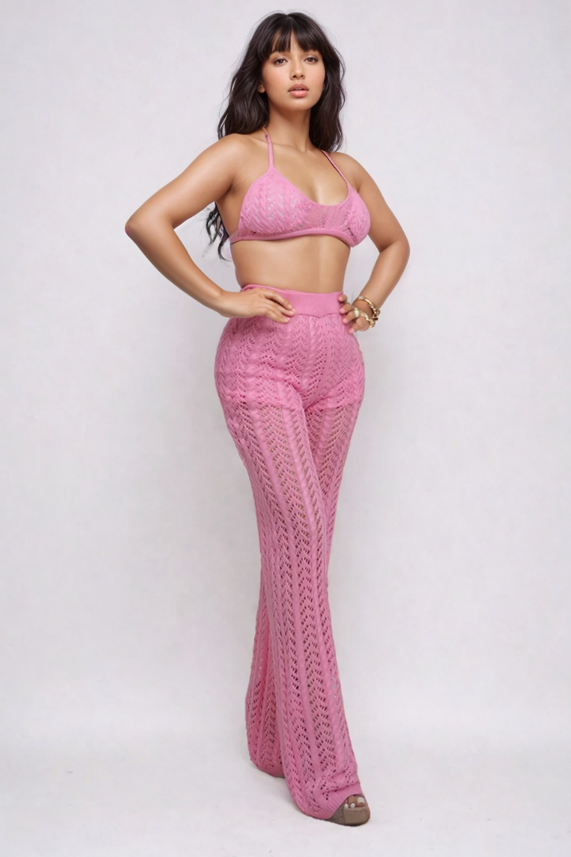 Pink crochet halter top and wide-leg pants set by ATHINA RETAIL, featuring a stylish, coordinated summer fashion ensemble.