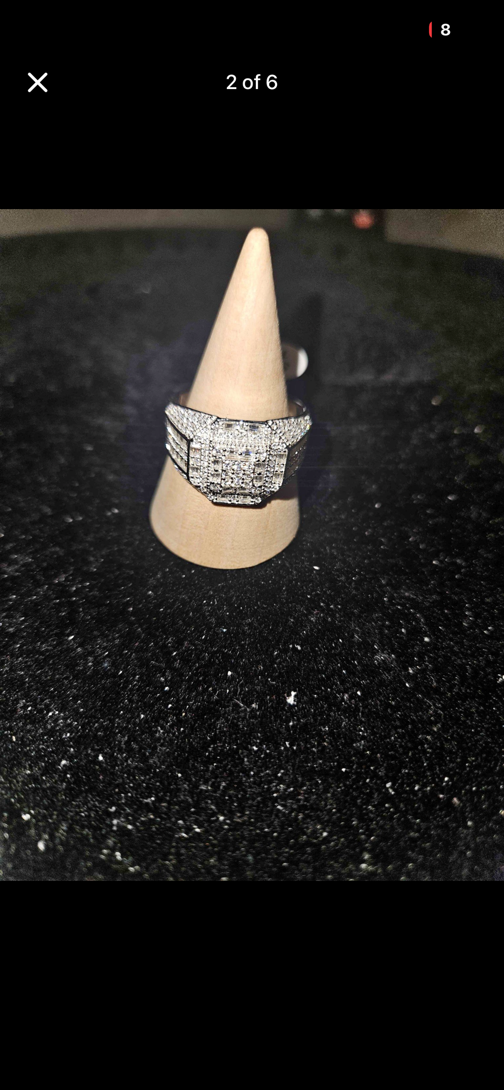 3.50CT Moissanite statement ring 925 sterling silver showcased on a display cone with a sparkling design.
