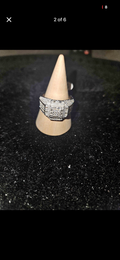 3.50CT Moissanite statement ring 925 sterling silver showcased on a display cone with a sparkling design.