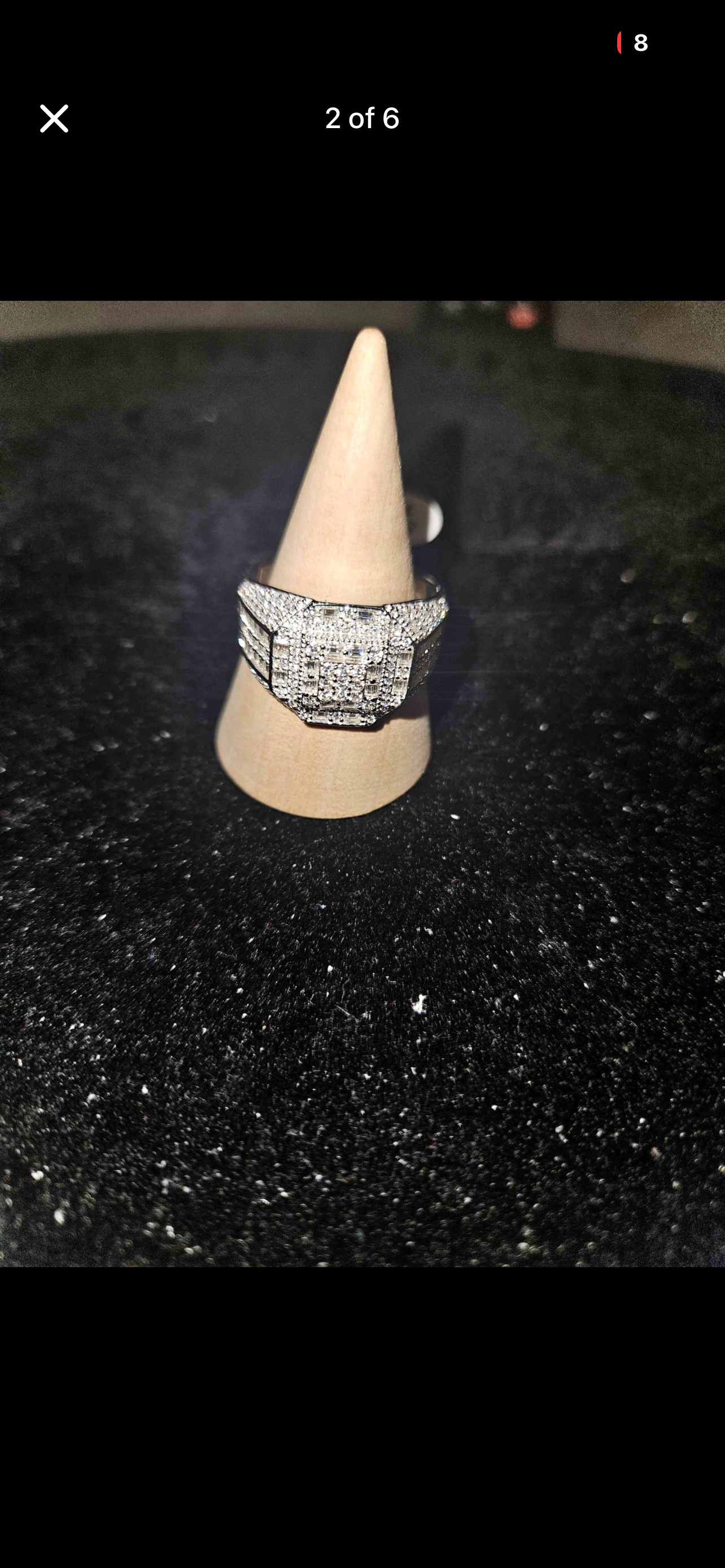 3.50CT Moissanite statement ring 925 sterling silver showcased on a display cone with a sparkling design.