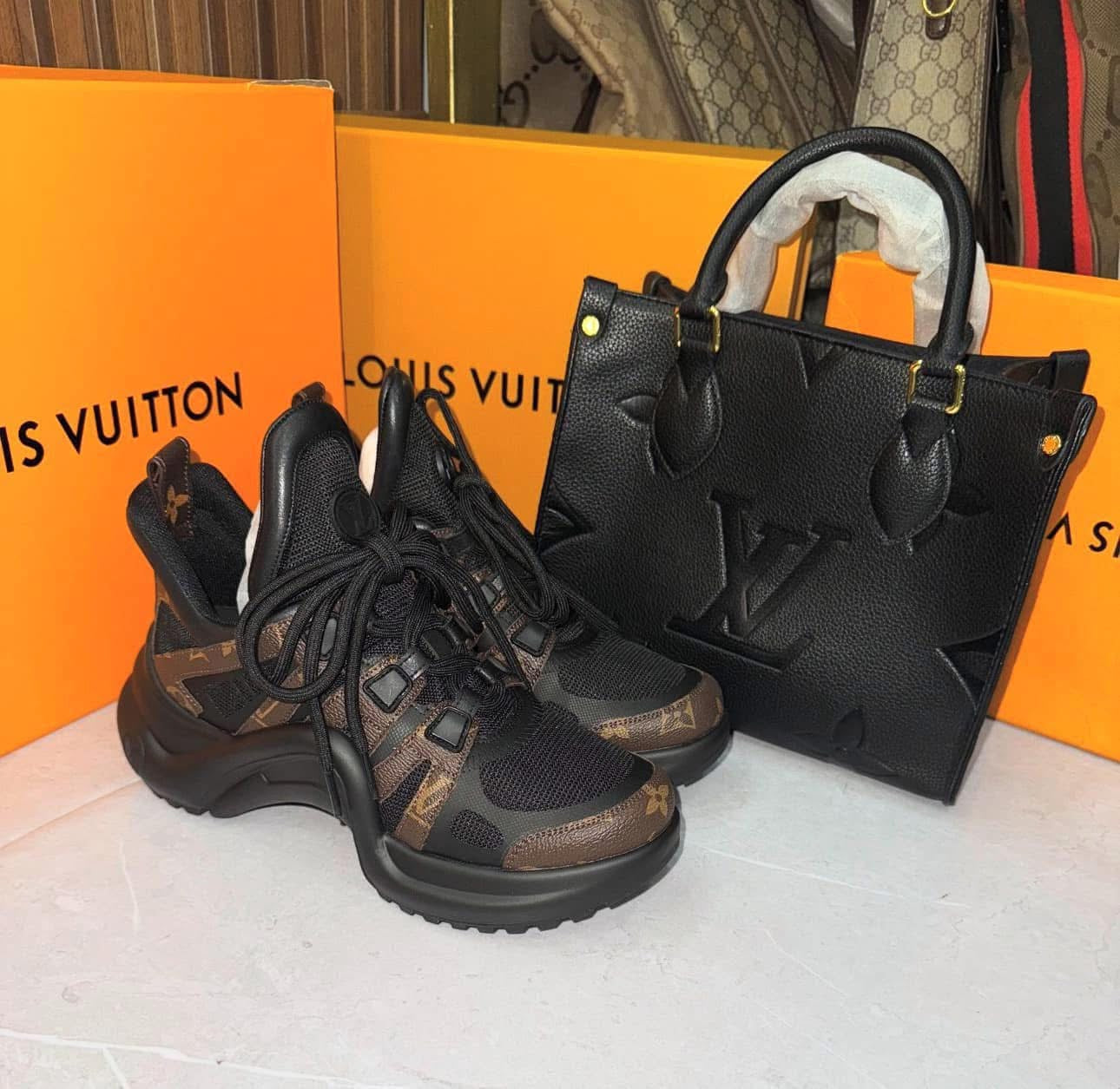 Luxury monogram sneaker set featuring athletic-style sneakers and structured tote bag, ideal for casual luxe looks.