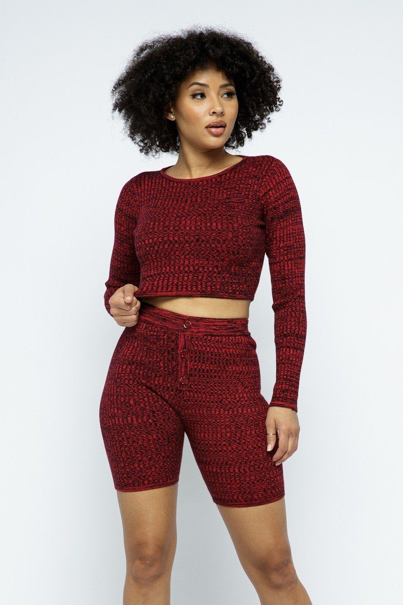 Knit long sleeve cropped top and biker shorts set in vibrant red, showcasing a chic ensemble for stylish comfort.