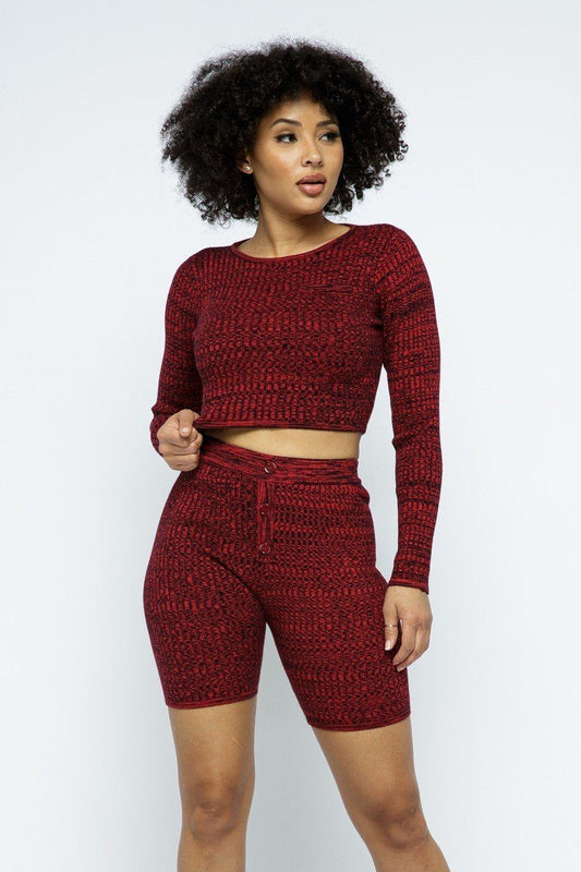 Knit long sleeve cropped top and biker shorts set in vibrant red, showcasing a chic ensemble for stylish comfort.