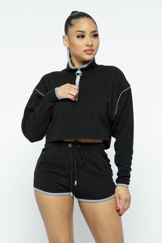 Sporty Crop Top and Shorts Set featuring a zippered cropped top with matching high-waist shorts.