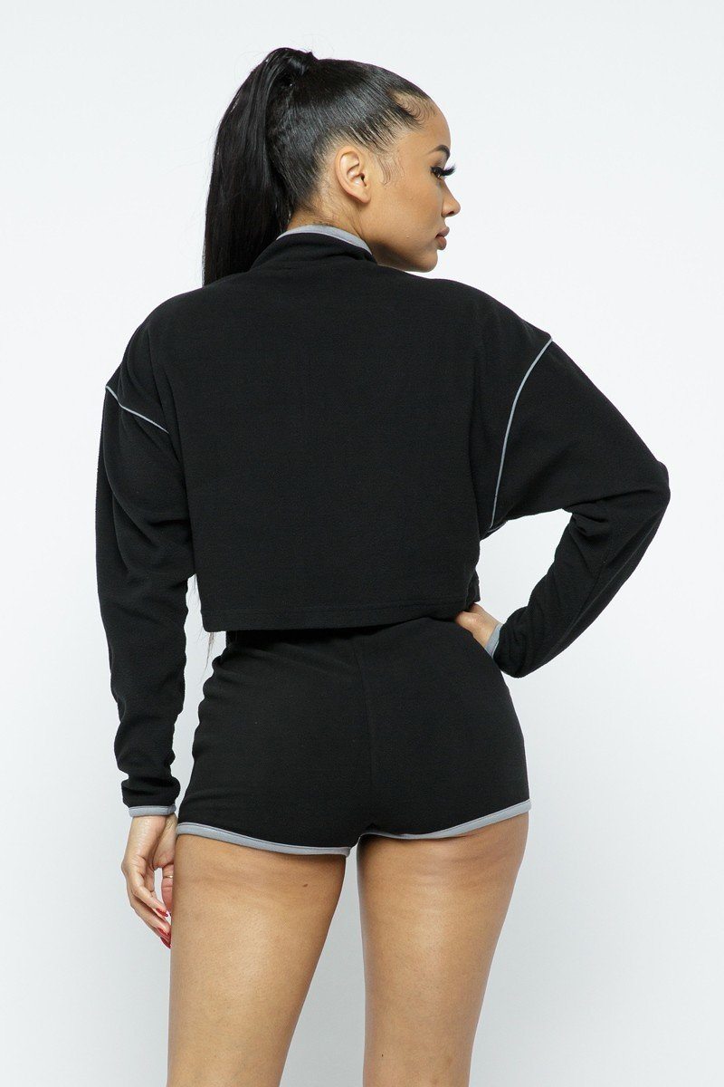 Sporty Crop Top and Shorts Set featuring a black zippered crop top and high-waist shorts, perfect for active lifestyles.