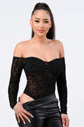 Leopard Print Off Shoulder Bodysuit featuring soft fabric and stylish design, worn by model showcasing fierce fashion.