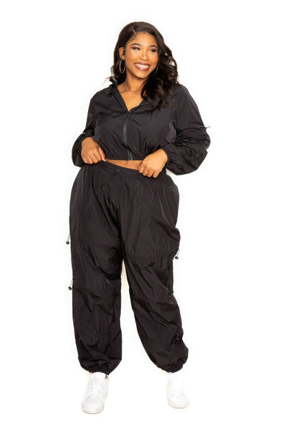 Active Zip Up Set With Cord Lock Detail in black, showcasing comfort and modern design, ideal for workouts.