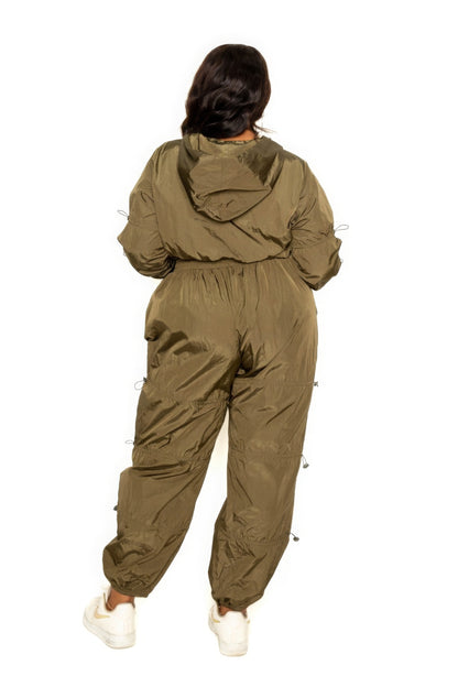Active Zip Up Set With Cord Lock Detail in olive green, showcasing the back view for mobility and style.