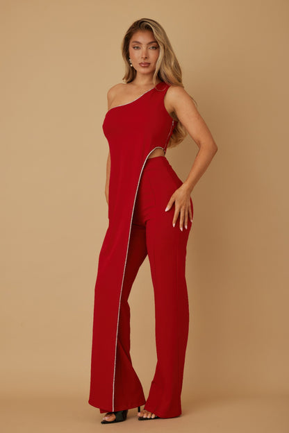 One shoulder rhinestone set featuring a dramatic red two-piece ensemble with stylish draped layers.