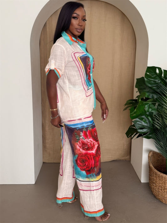 Model showcasing the Fresh Roses lounge set, featuring vibrant rose prints and comfortable wide-leg pants.