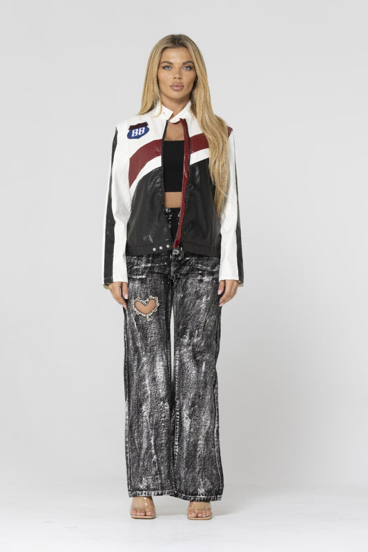 Alt Tag: Color Block Pu Leather Jacket on model with high neck snap collar, front zip closure and bold color block PU leather finish