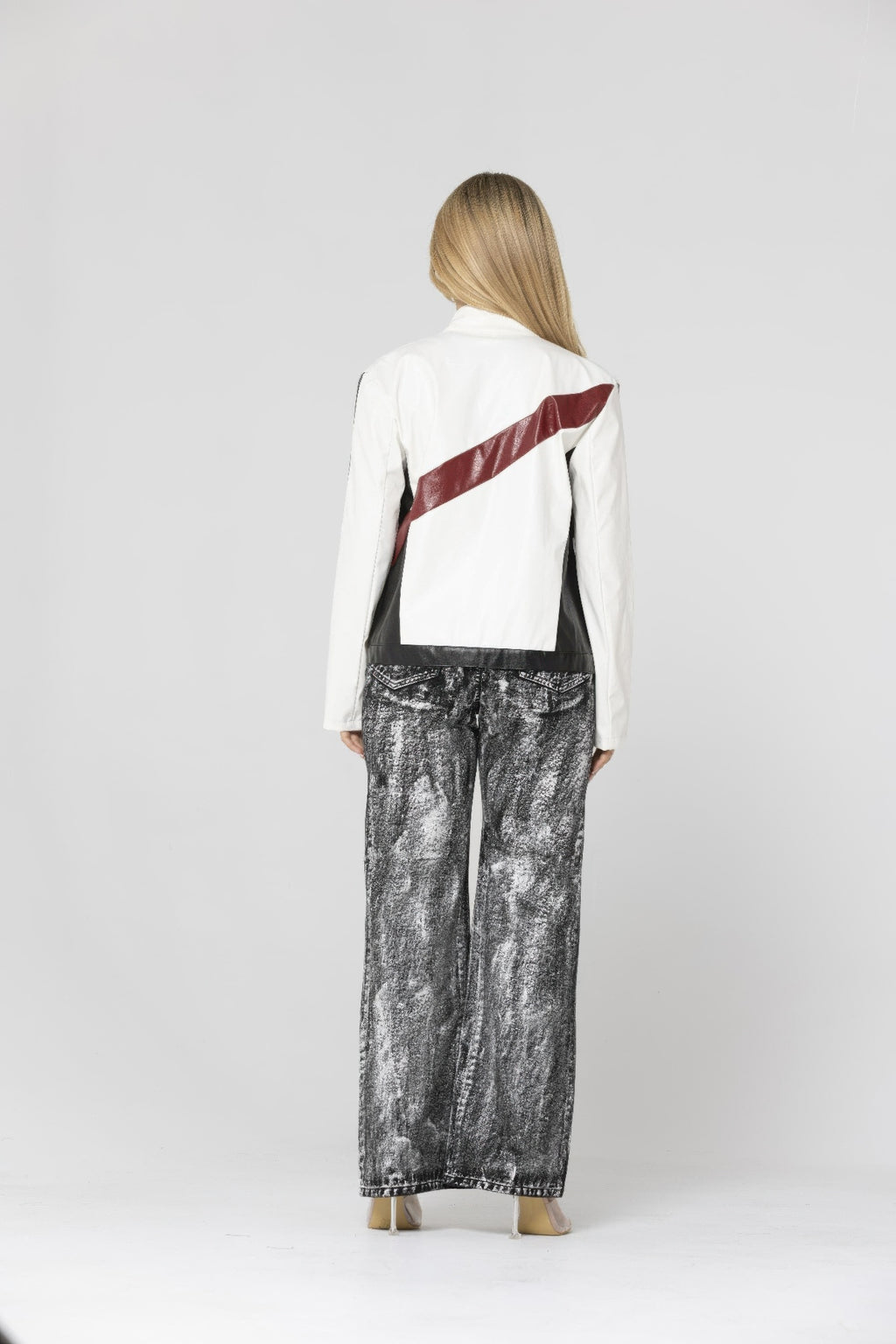 Alt Tag: Color Block Pu Leather Jacket back view with high neck collar, zip closure and bold diagonal color block panel