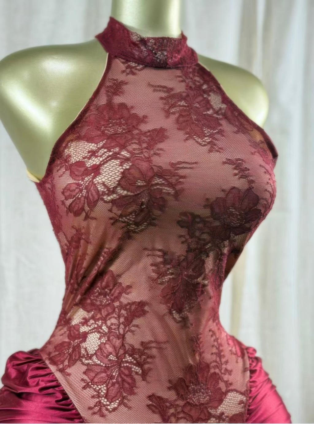 Close-up of the Crimson Lace Hourglass Dress featuring sheer floral lace and satin detailing.