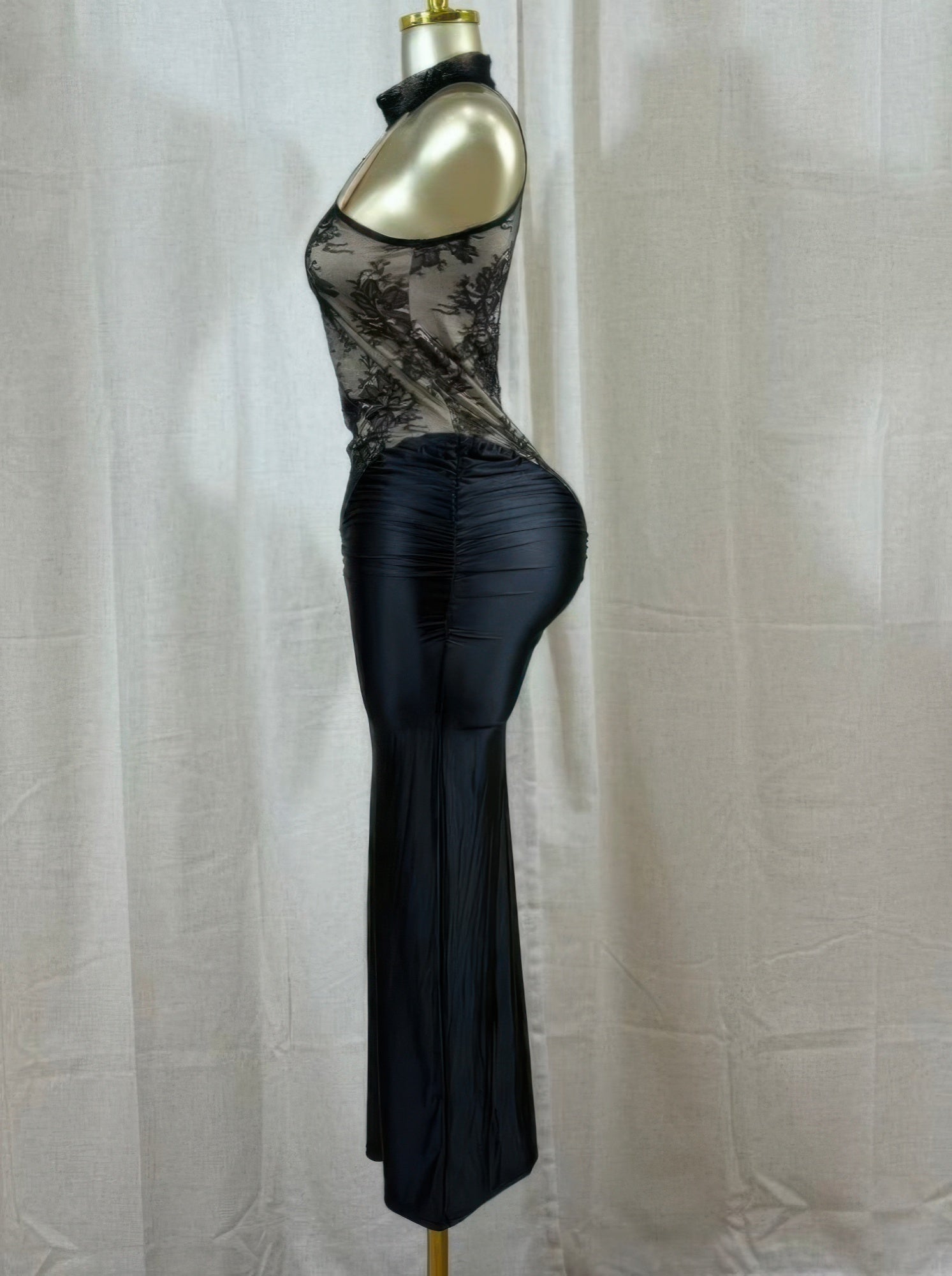 Crimson Lace Hourglass Dress featuring a sheer floral lace bodice and ruched satin skirt, showcasing side cutouts.
