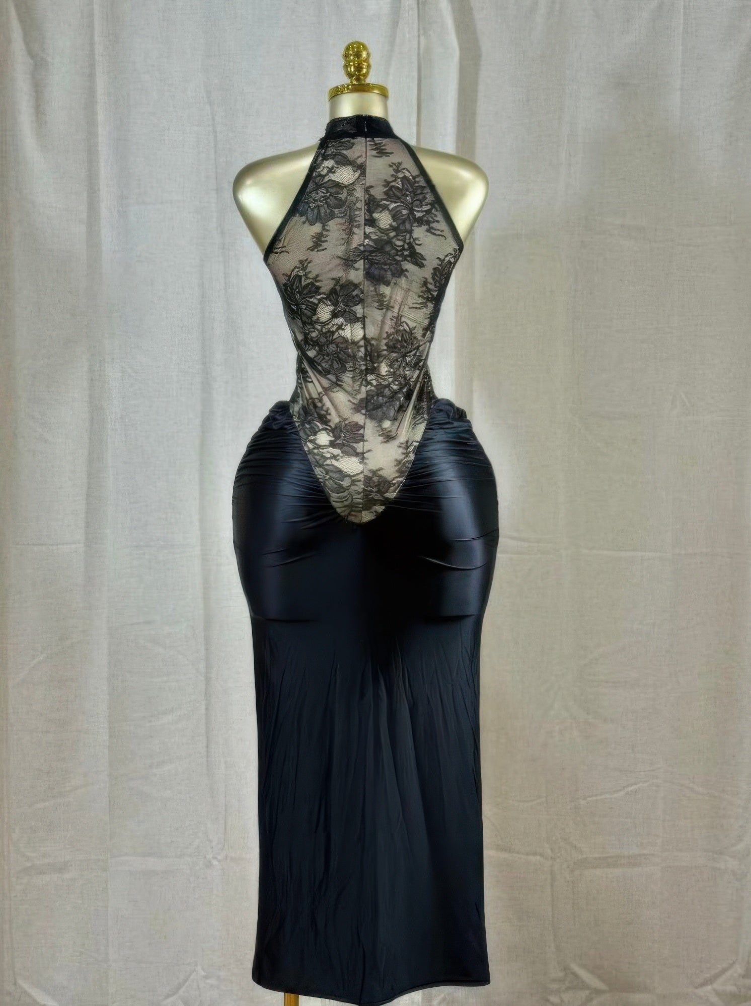 Crimson Lace Hourglass Dress featuring a halter neckline and sheer floral lace bodice, showcasing a sculpted hourglass silhouette.