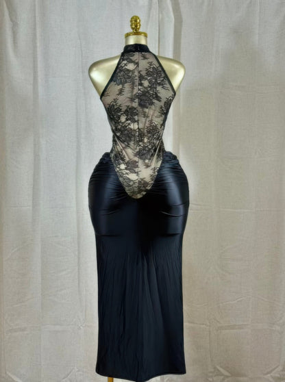 Back view of the crimson lace cutout midi dress showcasing halter neckline and floral lace detail.