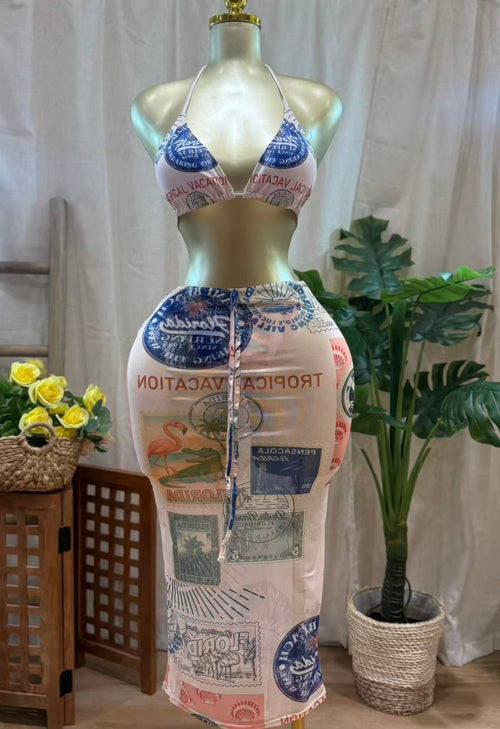 Vintage postcard bikini set displayed on a mannequin with matching bottoms, showcasing a retro postcard-inspired print.