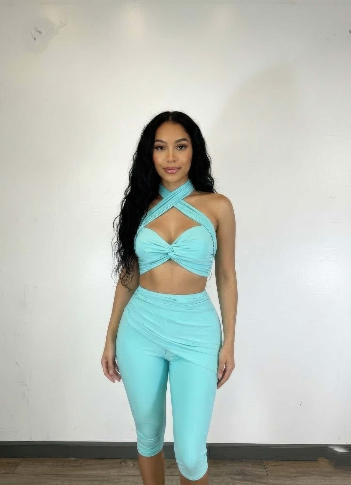Alt Tag: Crisscross Halter Two Piece Set in turquoise with twist-knot front and high-waist fitted pants, front view