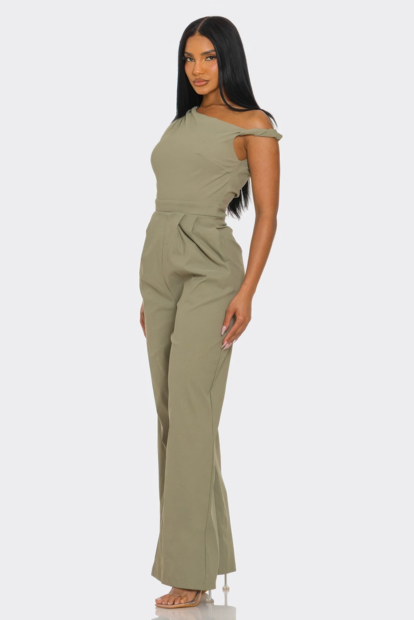 Elegant one-shoulder jumpsuit in olive green with tailored fit and wide-leg trousers.