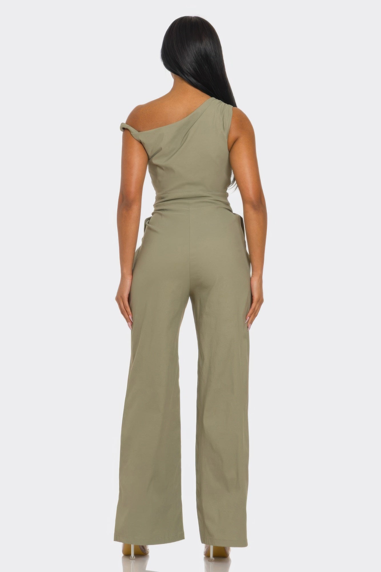 Back view of the chic Poised one-shoulder jumpsuit highlighting its tailored silhouette and asymmetrical neckline.