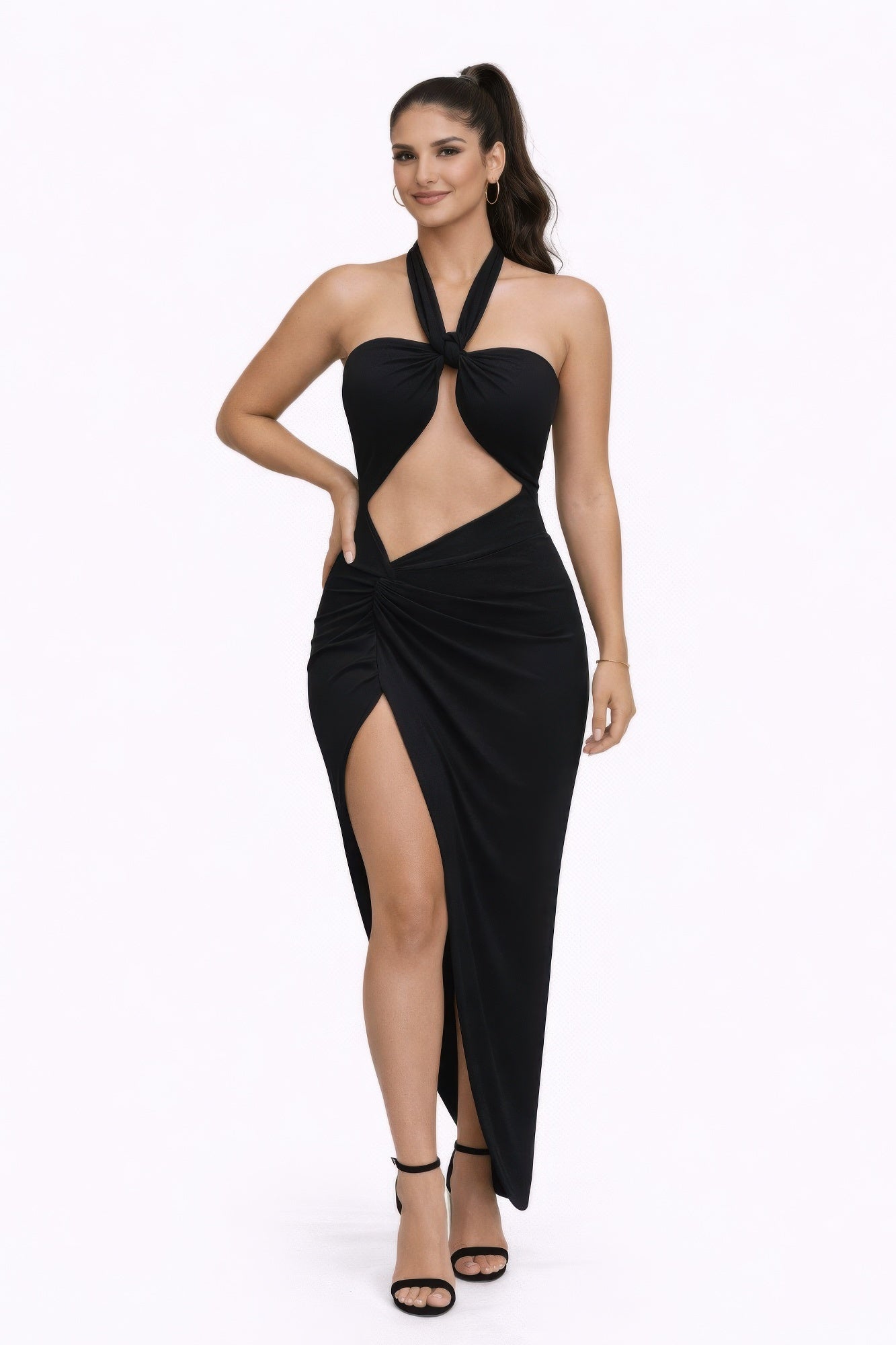 Model showcasing the bold statements dress, featuring a multiway neckline and stylish cutouts for a captivating look.
