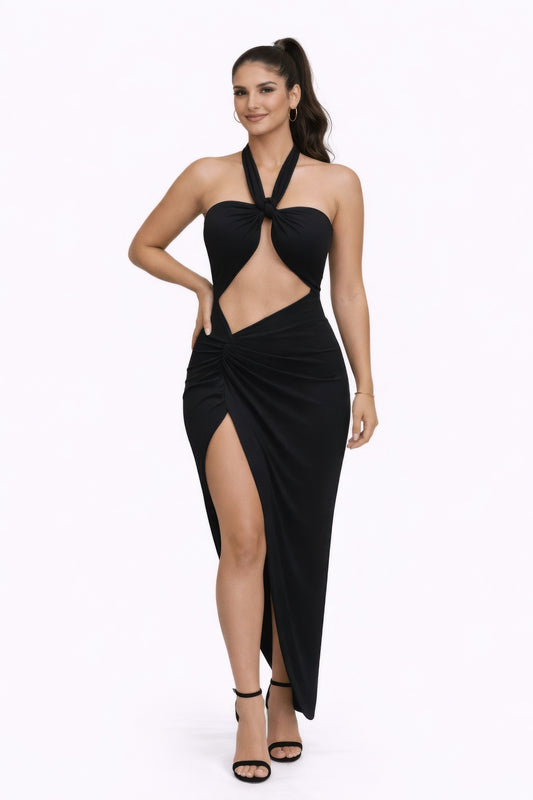Model showcasing the bold statements dress, featuring a multiway neckline and stylish cutouts for a captivating look.