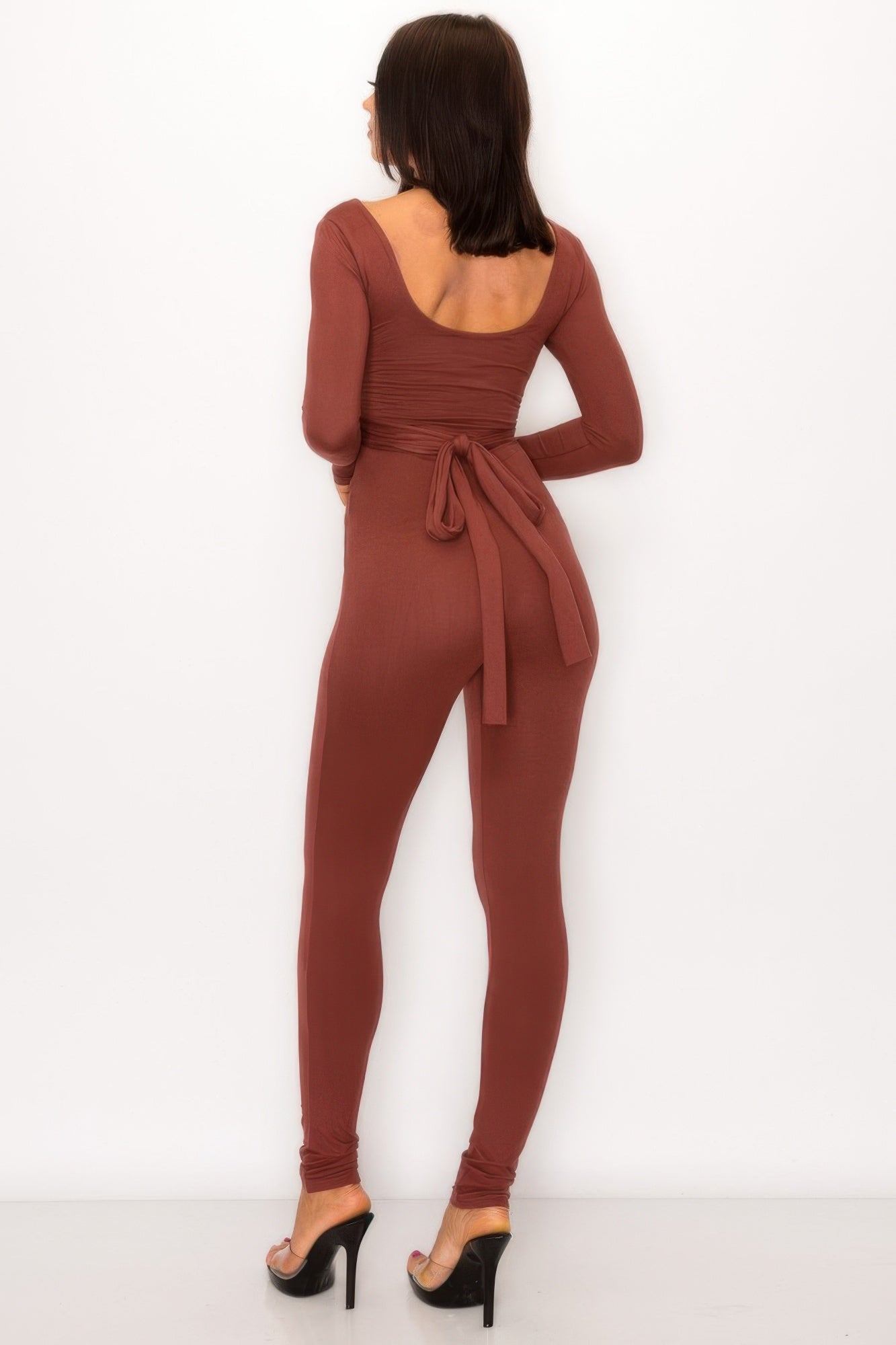 Back view of a Tie Back Cutout Jumpsuit showcasing the elegant back tie detail and sleek fit.